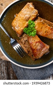 Braised pork spare ribs served on a plate. - Shutterstock ID 1939426873
