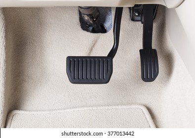 Brake and accelerator pedal of automatic transmission car in white interior