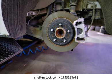 Brake Disc In The Service Center For The Replacement Of Car Tires.