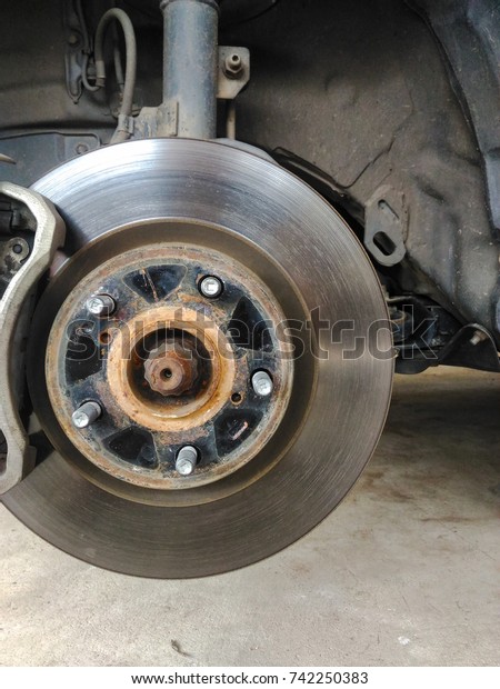 Brake discs , Close\
up of car disc brakes