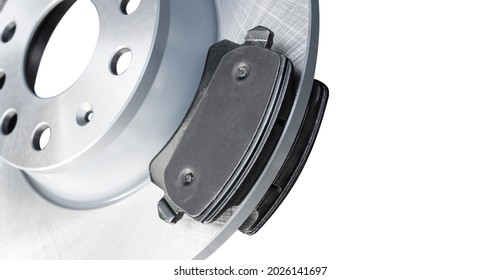 Brake discs and brake pads isolated on white background. Auto parts. Brake disc rotor isolated on white. Braking disk. Car part. Quality spare parts for car service or maintenance	 - Shutterstock ID 2026141697