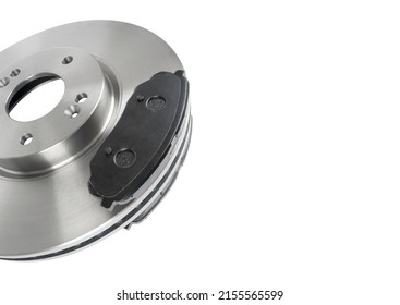 Brake discs and brake pads isolated on white background. Auto parts. Brake disc rotor isolated on white. Braking disk. Car part. Car detailing. Spare parts. - Shutterstock ID 2155565599