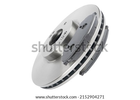 Brake discs and brake pads isolated on white background. Auto parts. Brake disc rotor isolated on white. Braking disk. Car part. Car detailing. Spare parts.