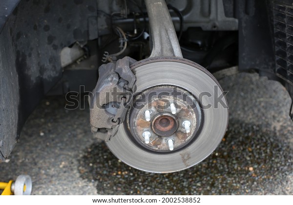 Brake Fluid Leak with wheel taken off to reveal\
brake disc