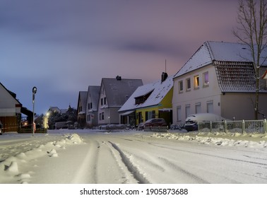 Brake, Germany - January 30, 2021: Scenic Snow In The Street Wilhelmstraße At Night