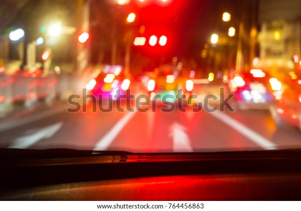 Brake light on the road at\
night.