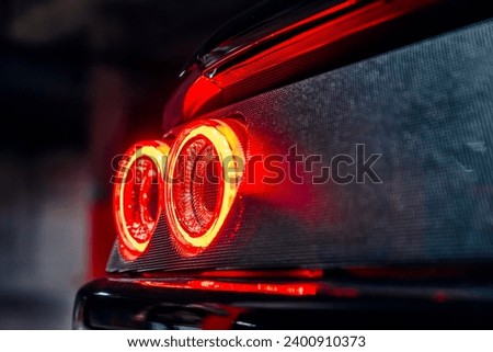 Brake lights on a black car