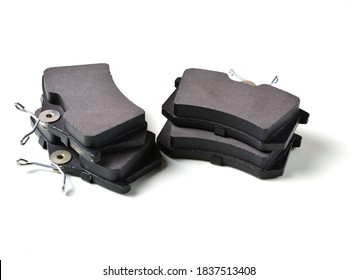 Brake Pads For Disc Brakes On A White Background. Car Repair Concept, Brake Replacement, Car Maintenance. Copy Space.