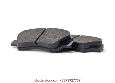 Brake pads on white background, passenger car brake system - Powered by Shutterstock