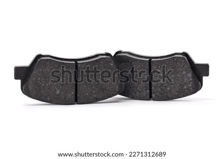 Brake pads for passenger car on white background