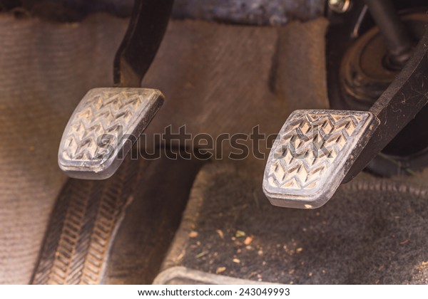 Brake pedal and\
accelerator in a car
