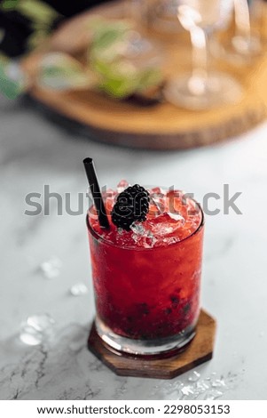 Bramble Cocktail refreshing gin, lemon juice, syrup and blackberries