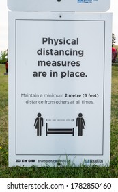 Brampton, ON / Canada - July 14 2020: Physical Distancing Measures Sign For Covid 19 Precaution Posted At Chinguacousy Park In Brampton Ontario, Canada