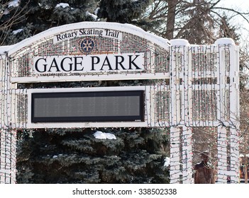 BRAMPTON, ON - FEBRUARY, 2014 Gage Park Sign In Beautiful Downtown Brampton. The Sign Is Covered In Christmas Lights.