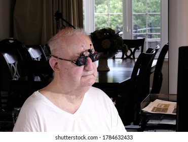 BRAMPTON, ONTARIO / CANADA - JULY 27 2020: Senior Male Getting Eye Test At Home