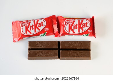 BRAMPTON, ONTARIOCANADA - AUGUST 21, 2021: Two Wrapped KitKat Candy Bars With 4 Sections Of Chocolate Wafers On White Background. Made By Nestle. Halloween Candy 