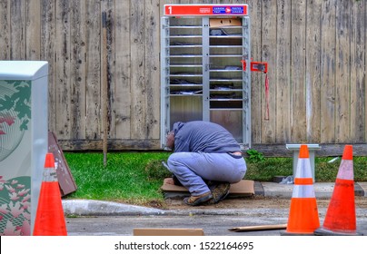 BRAMPTON,ONTARIO/CANADA - OCTOBER 3 2019: Canada Post Worker Installing New Community Mailbox