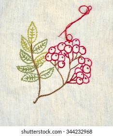 Branch Of Mountain Ash On The Fabric Embroidered With Chain Stitch