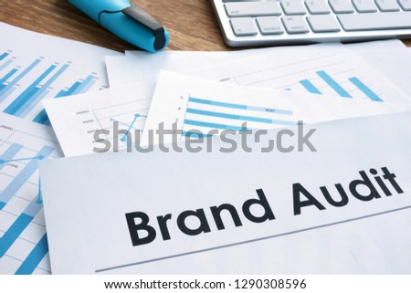 Brand audit report, documents and keyboard.