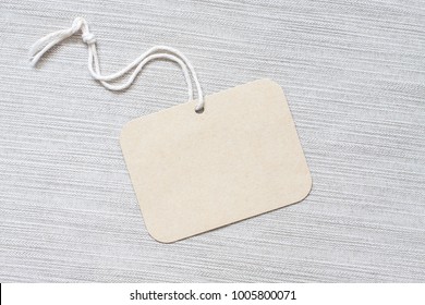 Brand Label, Blank Price Tag Mockup On Cloth Texture Background