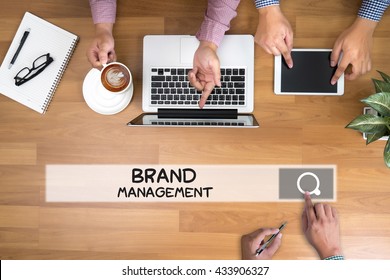 BRAND MANAGEMENT Man Touch Bar Search And Two Businessman Working At Office Desk And Using A Digital Touch Screen Tablet And Use Computer, Top View