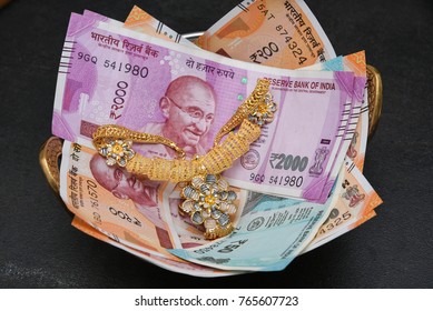 The Brand New Indian Currency Bank Notes Of 200 And 2000 Rupees Bundle. Success And Got Profit From Business.
Gold Loan On Jewellery. GST Tax On Goods And Service.