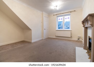 A Brand New Modern British Home Showing The Living Room With A Fire Place And Fire Place Mantle Place 