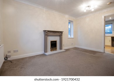 A Brand New Modern British Home Showing The Living Room With A Fire Place And Fire Place Mantle Place 