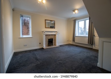 A Brand New Modern British Home Showing The Living Room With A Fire Place And Fire Place Mantle Place 