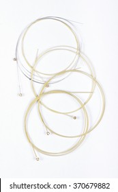 Brand New Phosphor Bronze Guitar Strings Isolated On The White Background Ready For Replacement