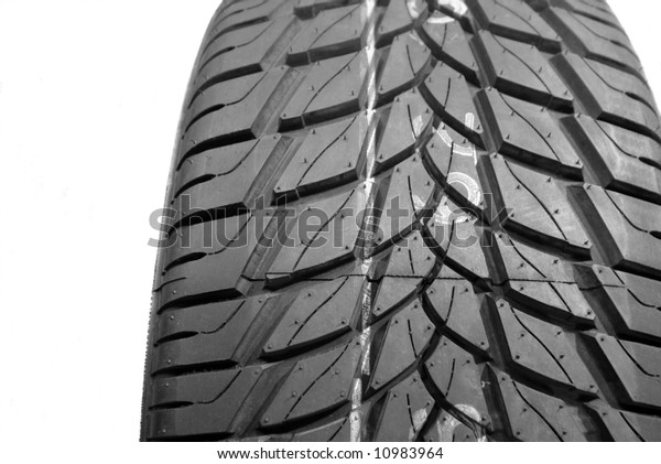 Brand new tire\
pattern on white\
background