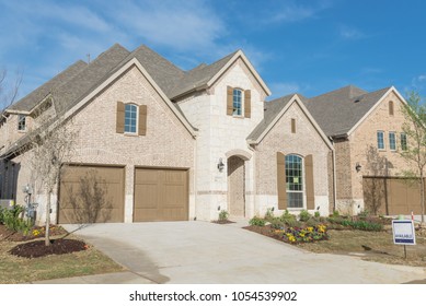 Brand new two story residential house, newly constructed and freshly built with landscaped yard. Real estate development in suburban neighborhood at Irving, Texas, USA