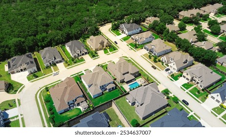 Brand new two-story suburban houses with large backyard, swimming pools, grassy lawn, lush greenery trees in upscale residential neighborhood of Flower Mound, Dallas Fort Worth metroplex, aerial. USA - Powered by Shutterstock