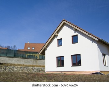 Brand New White House In Village With Blue Sky