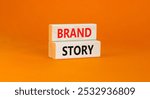 Brand story branding symbol. Concept words Brand story on beautiful wooden blocks. Beautiful orange background. Business brand story branding concept. Copy space.