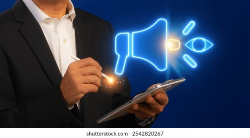 Brand visuality icon, Public Relations concept for construction, Investment, business development and Engineering. Businessman shows glowing neon line of megaphone with eye icon on virtual screen. - Powered by Shutterstock