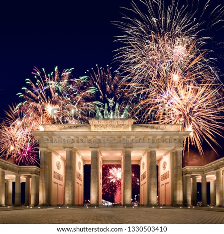 Brandenburg gate with fireworks on New Year´s Eve, Berlin, Germany Stock fotó © 