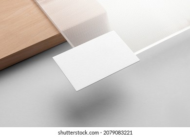 Branding stationery mockup template, with reeded glass and wooden elements, real photo,  business cards. Blank isolated on a white background to place your design. 