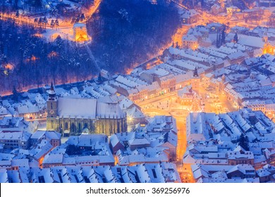 Brasov, Romania. Arial View Of The Black Church And City Square During Winter.