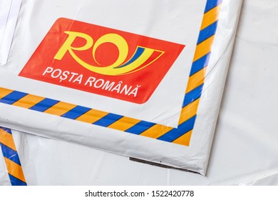 BRASOV, ROMANIA - OCTOBER 4, 2019 - Plastic Mail Envelopes With Romanian Postal Service Logo, Top Down View