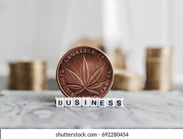 Brass Big Marijuana Coin With Cannabis Leaf Near Business Inscription.