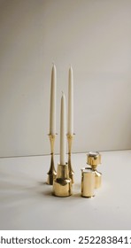 Brass candle holders in mid century modern design pattern. Denmark 1960s.