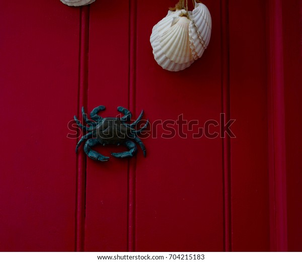 Brass Crab Knocker Knocker On Red Stock Photo Edit Now 704215183