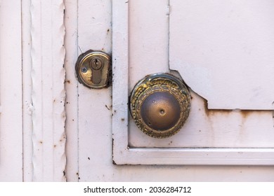 Brass Doorknob And Lock. Old Metal Door.