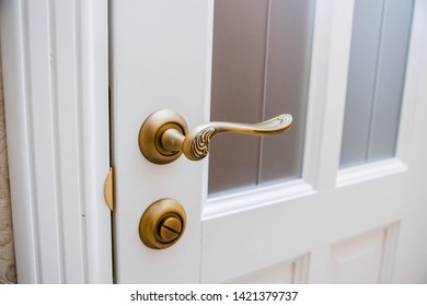 Brass Doorknob With An Ornament Close Up