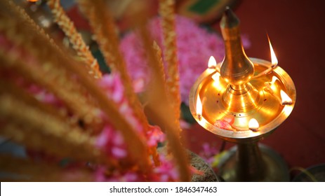 brass oil lamps setup for a traditional kerala hindu wedding ceremony