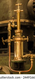 Brass oil unit found on old steam engine.