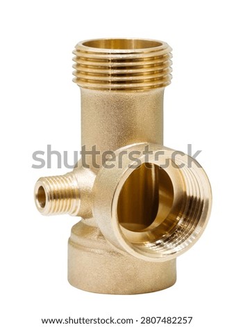 Brass plumbing fitting with three threaded connections. One outlet extends vertically upward. Another connects sideways with an open bore. Third faces forward toward viewer