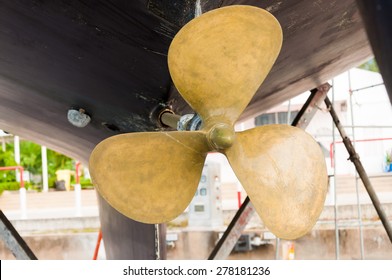 Brass ship propeller check up at the shipyard