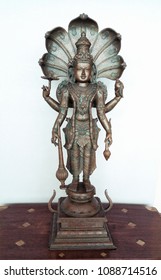 A Brass Statue Of Lord Vishnu